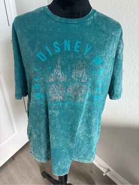 Disney Parks Walt Disney World 4-Park Icon Tee in a teal acid wash color